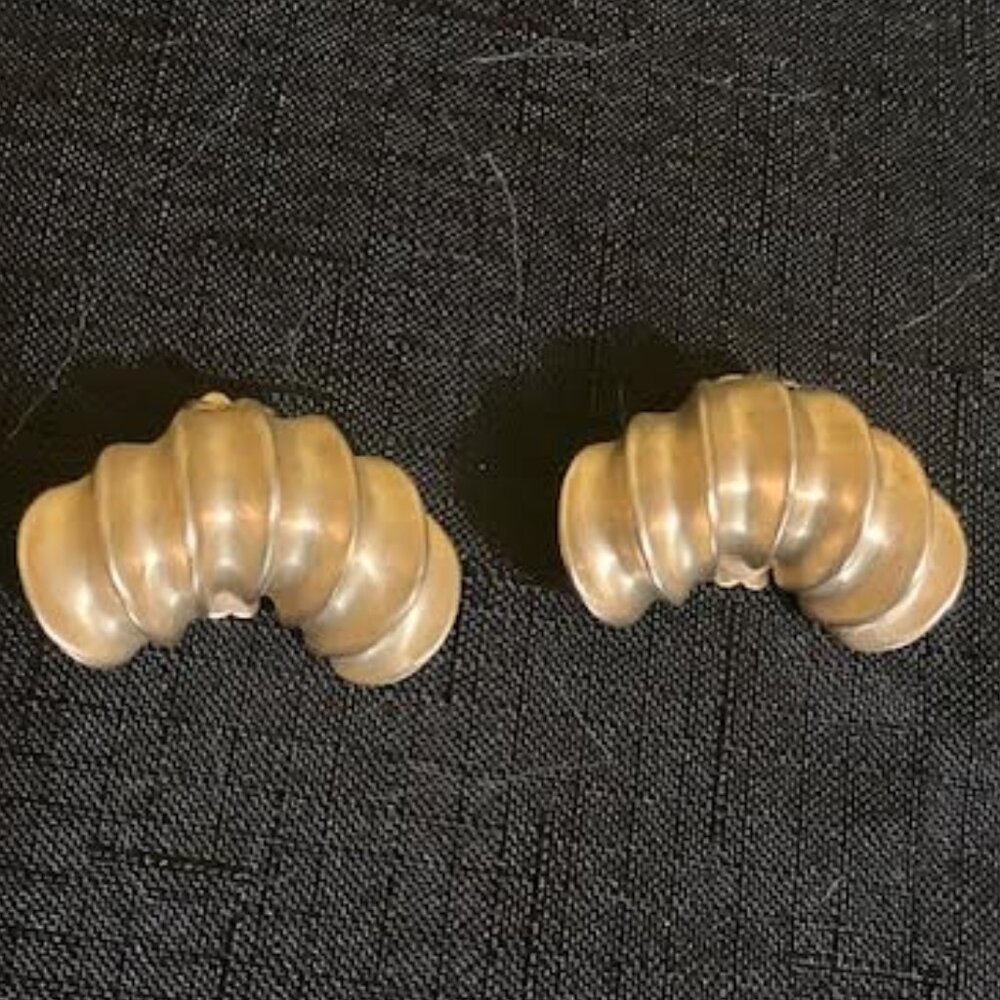 Clara Gold tone clip on earrings